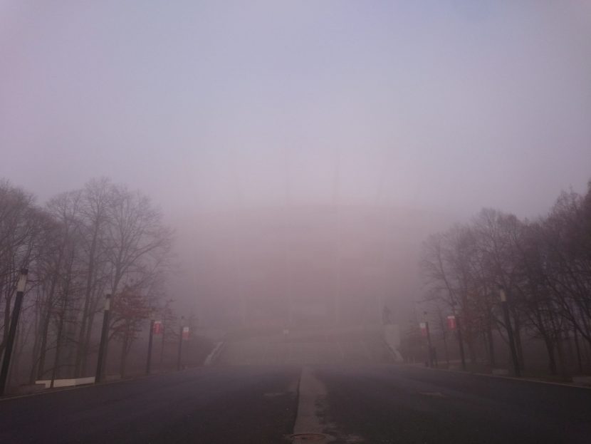 national stadium in fog