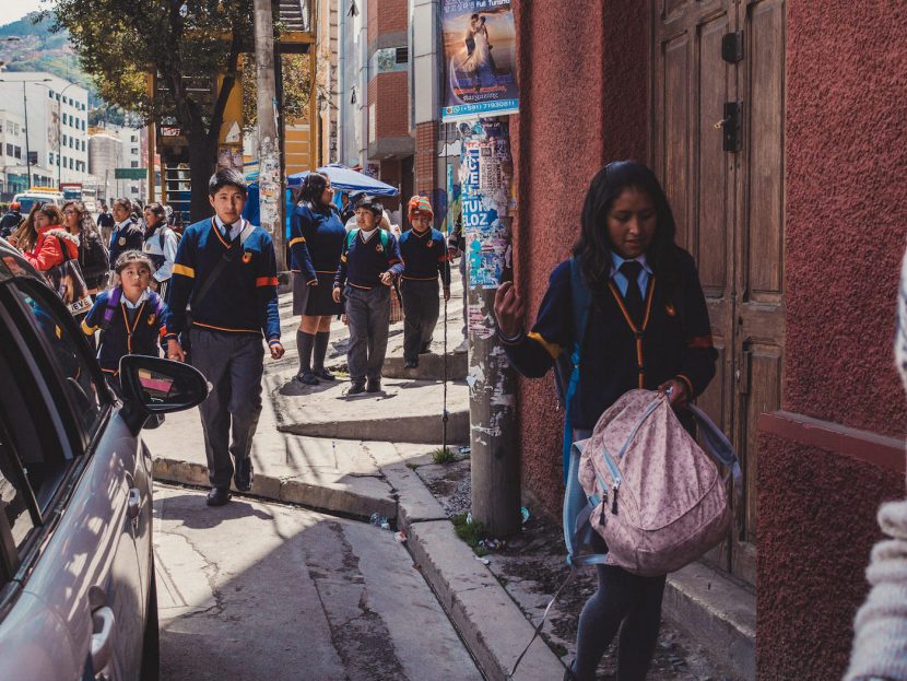 Children in uniforms on the street